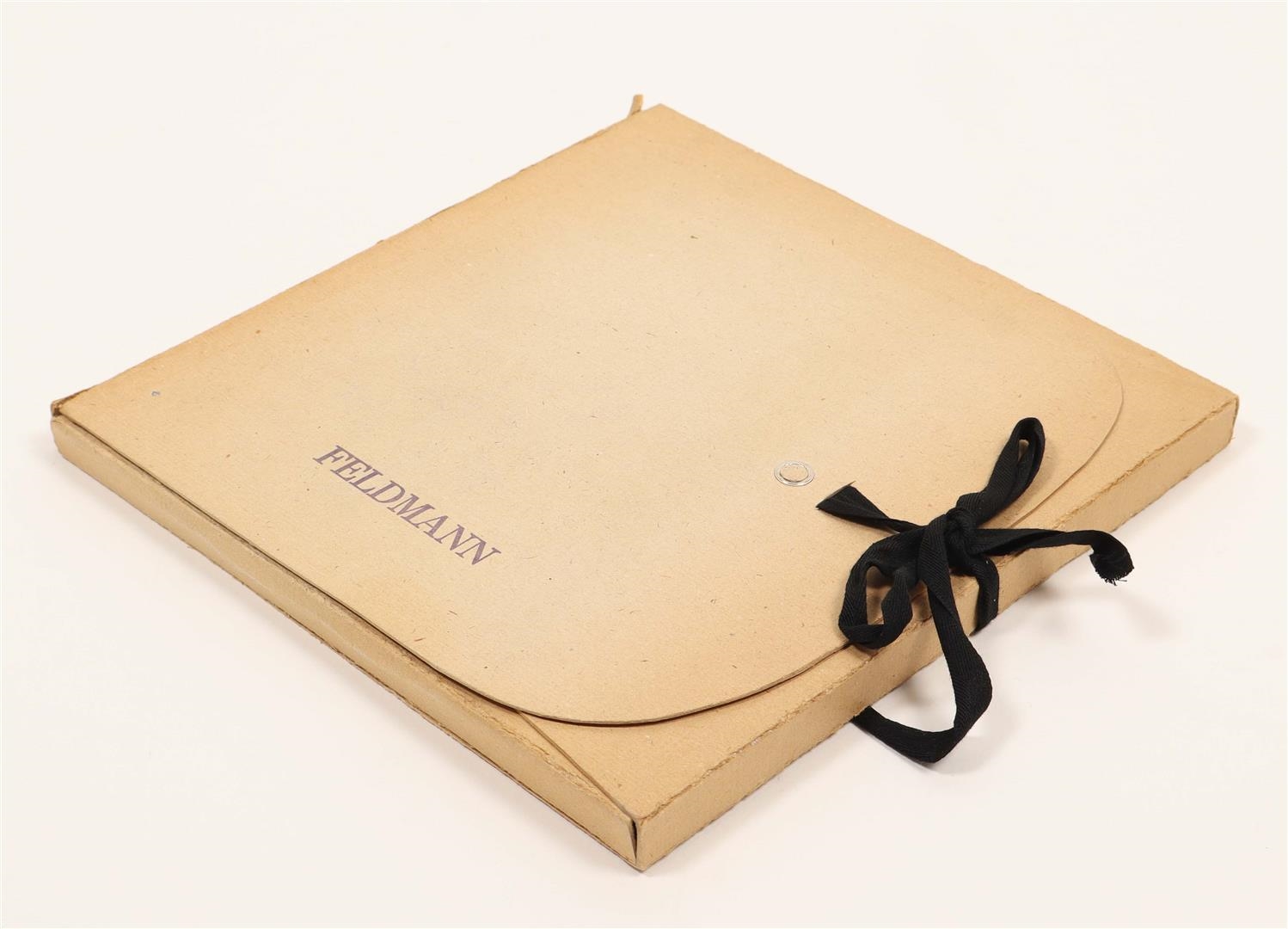 A grid of beige paper cards with printed text arranged in a scattered layout.