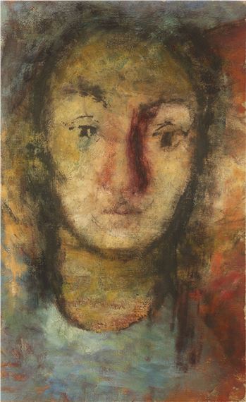 A painting of a woman's face on a piece of paper.