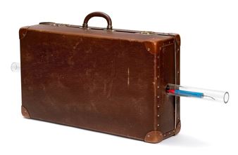 A brown suitcase with a syringe sticking out of it.