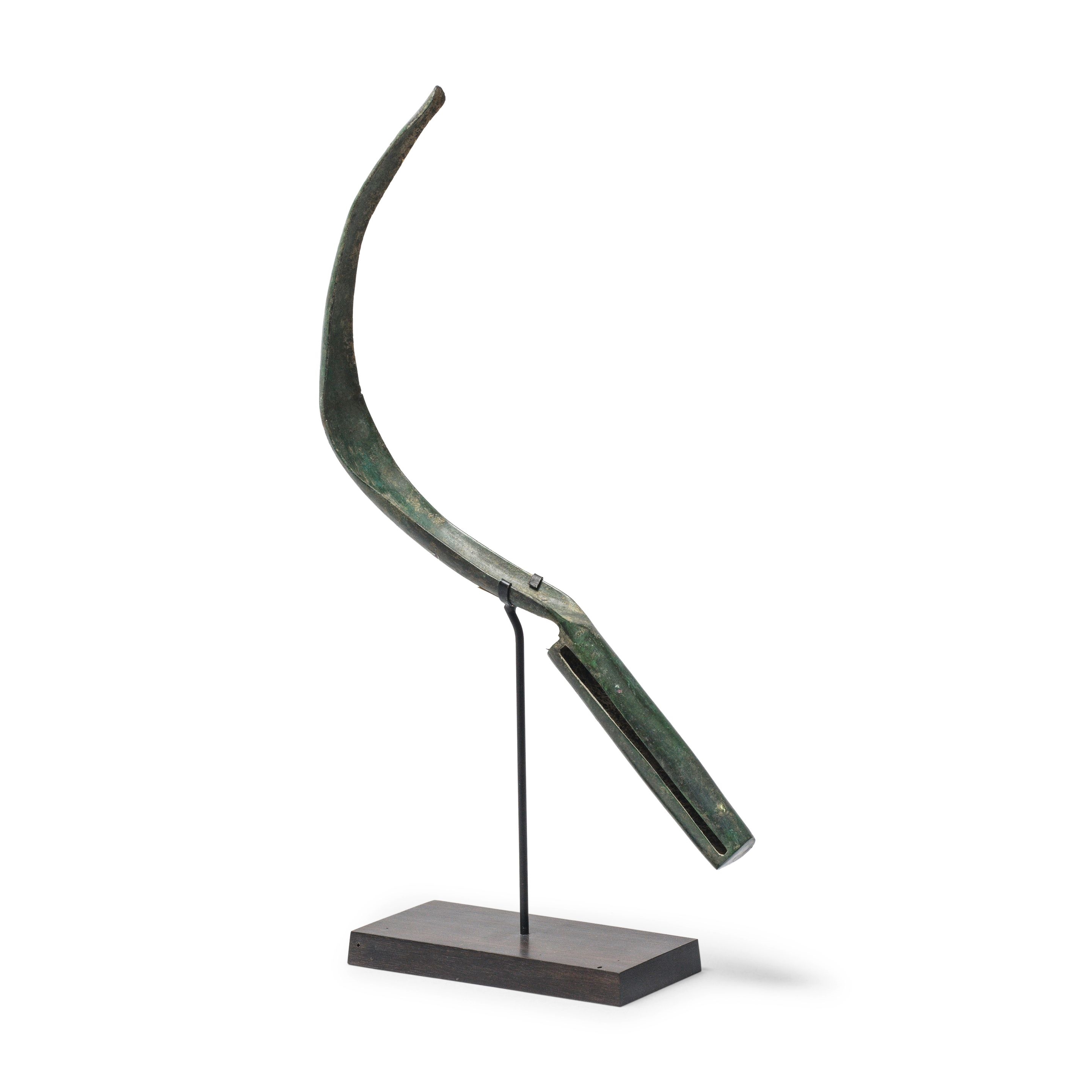 Roman School | A Roman bronze strigil (1st Century 2nd Century) | MutualArt
