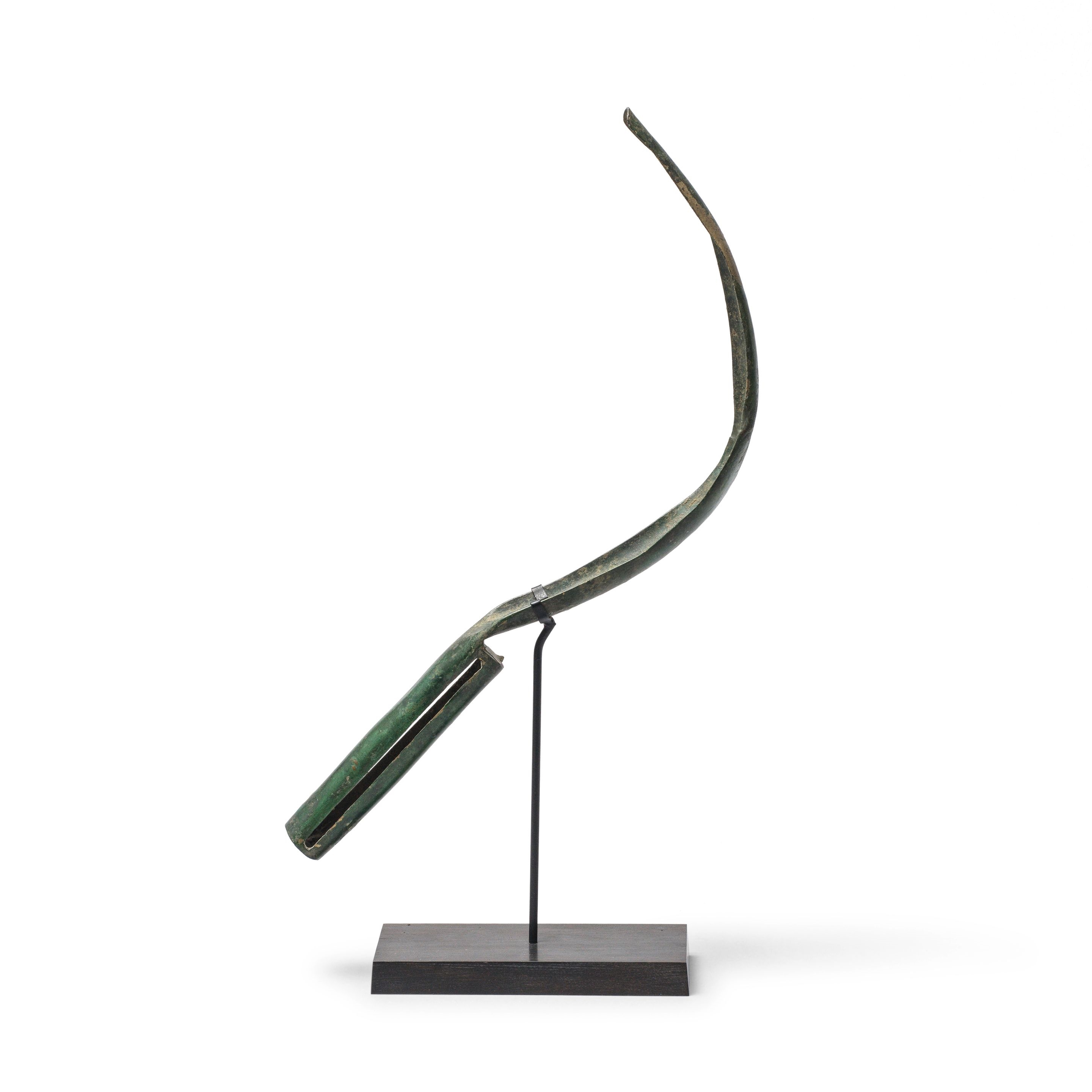 Roman School | A Roman bronze strigil (1st Century 2nd Century) | MutualArt
