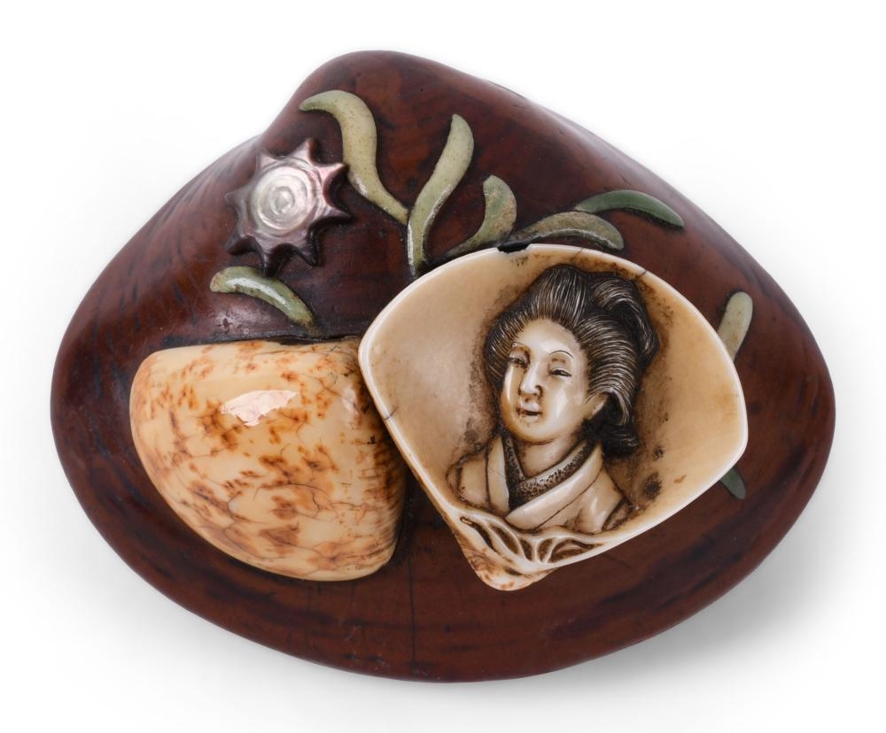 Tadatoshi | WOOD AND SHELL INLAYED CLAM-SHAPED NETSUKE | MutualArt