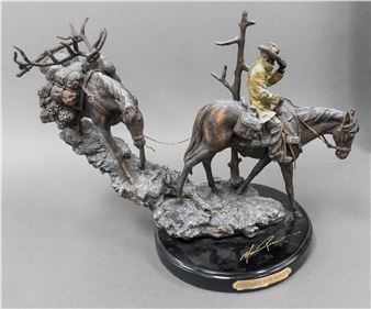 A bronze sculpture depicting a hunter on horseback with a deer carrying a bow and arrow.