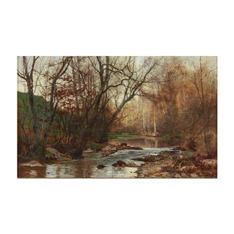A serene autumn landscape featuring a winding stream through a forest of bare trees.
