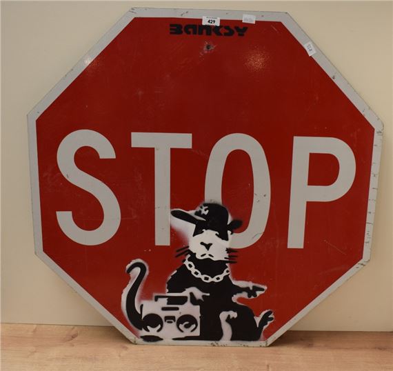 Retrospective American stop sign - Banksy