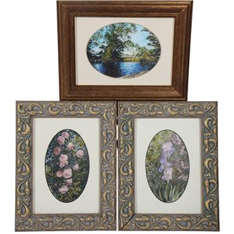 A set of three framed botanical and landscape prints arranged in a triangular composition.