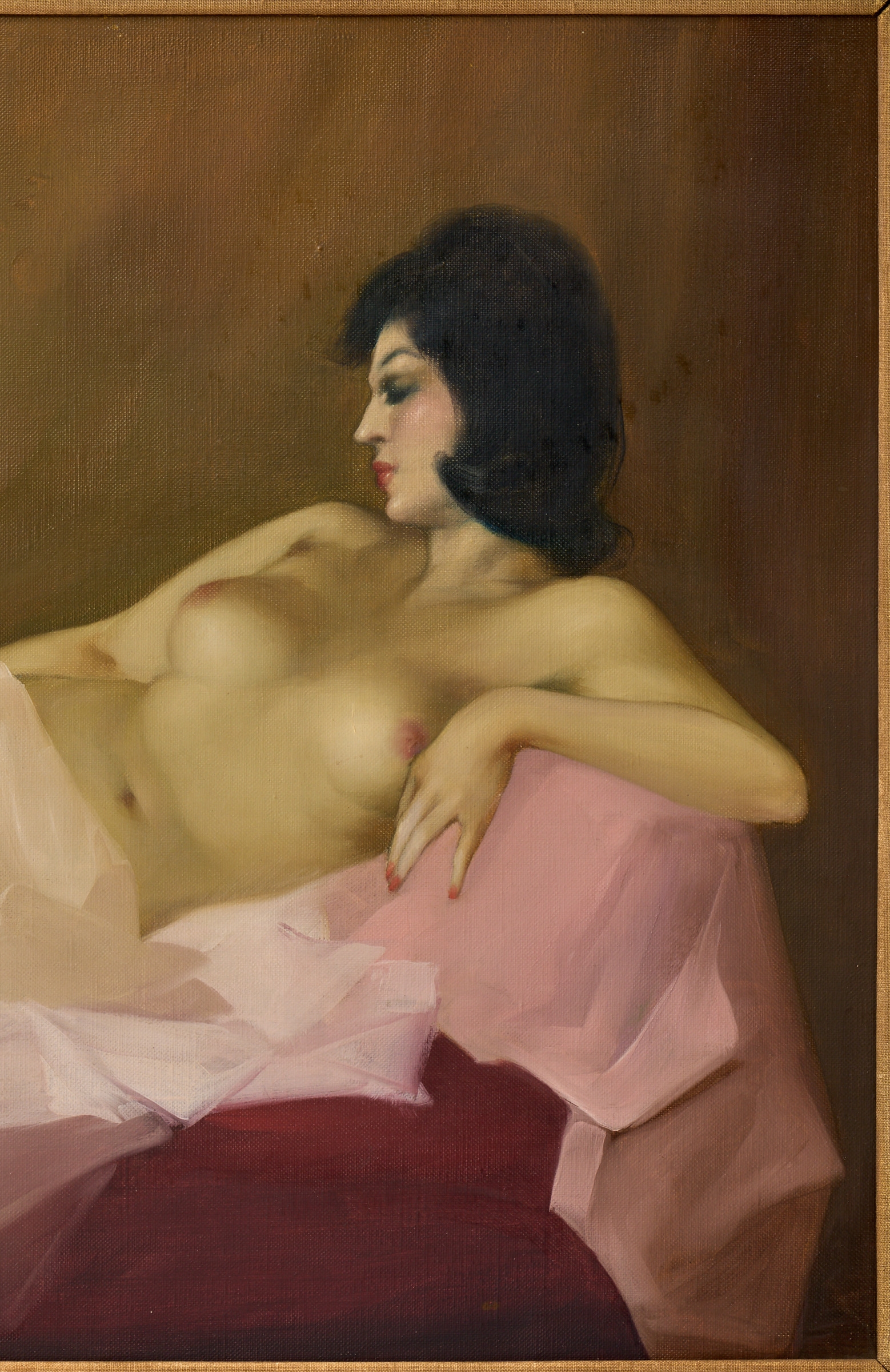 A classical oil painting of a reclining nude figure in a bed, framed in ornate gold.