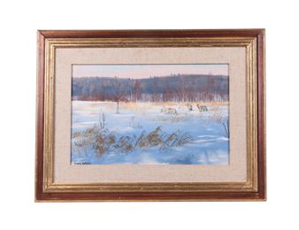 A framed winter landscape painting depicting a snowy field with distant trees and a soft, muted color palette.