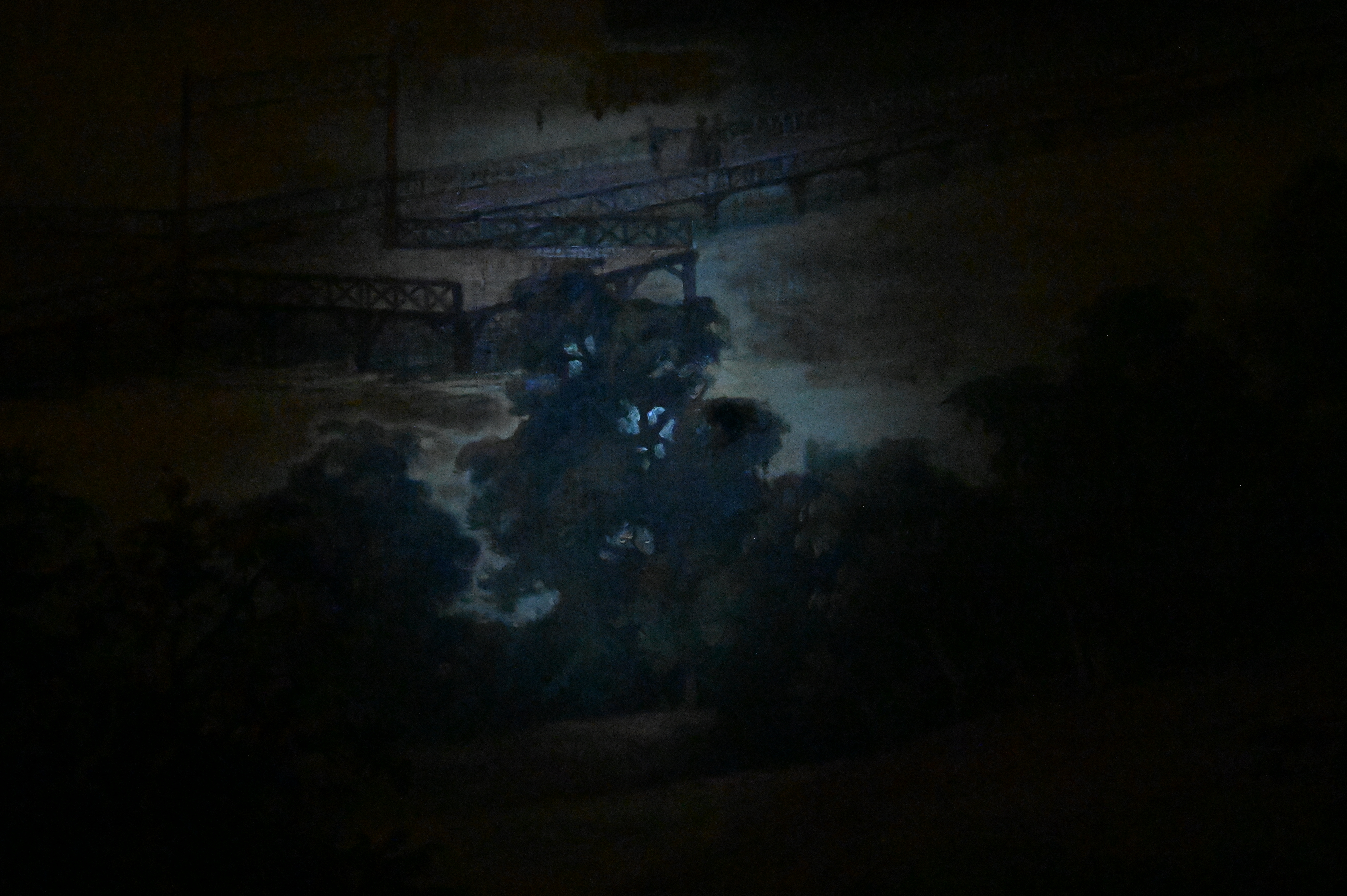 A romanticized landscape painting featuring a couple gazing at a distant city from a hillside.
