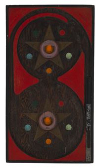 A PAINT-DECORATED TABLETOP PINBALL MACHINE