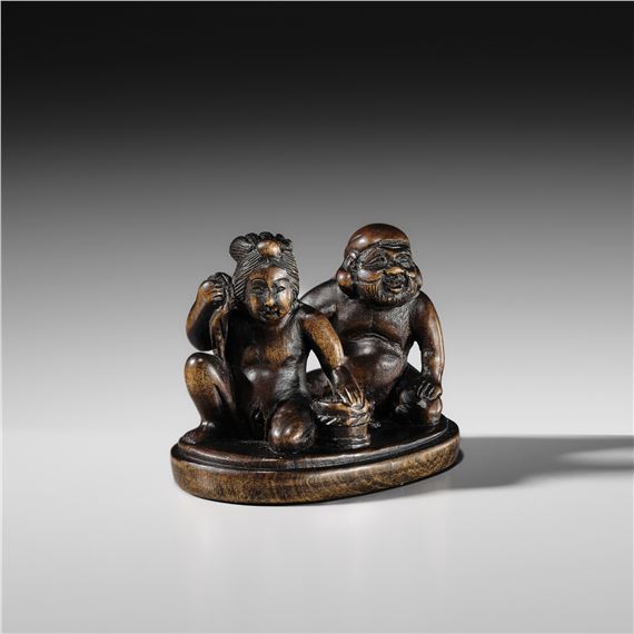 Japanese School, 19th Century | AN AMUSING SHUNGA WOOD NETSUKE OF EBISU ...