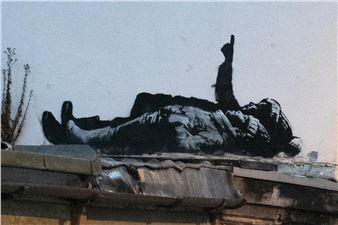 Banksy Reveals Twin Murals Across London