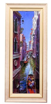 A framed painting of a canal scene with gondolas and colorful buildings.