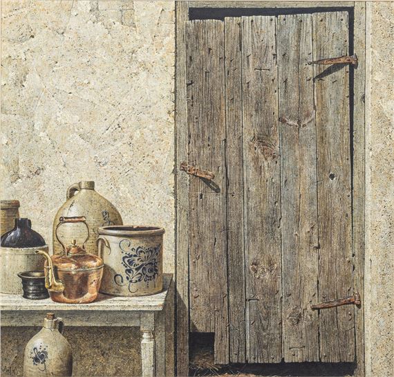 A rustic still life featuring antique pottery and a weathered wooden door.
