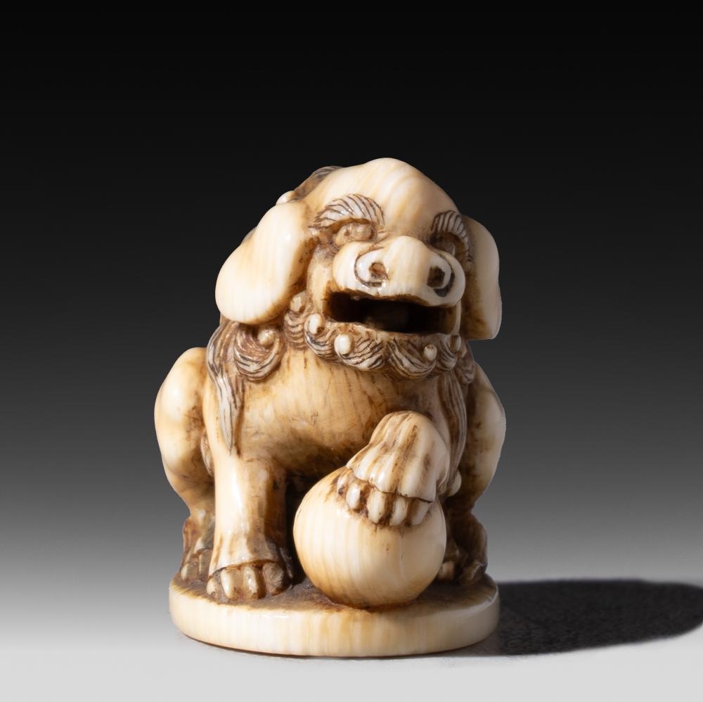 Japanese School, 19th Century | A Japanese ivory netsuke of a shishi ...