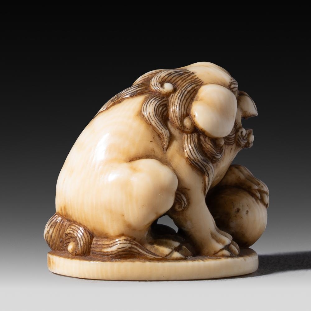 Japanese School, 19th Century | A Japanese ivory netsuke of a shishi ...