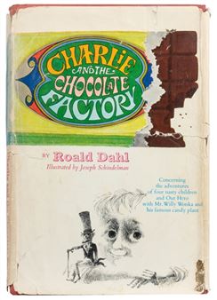A book with a picture of Charlie and the Chocolate Factory on it.
