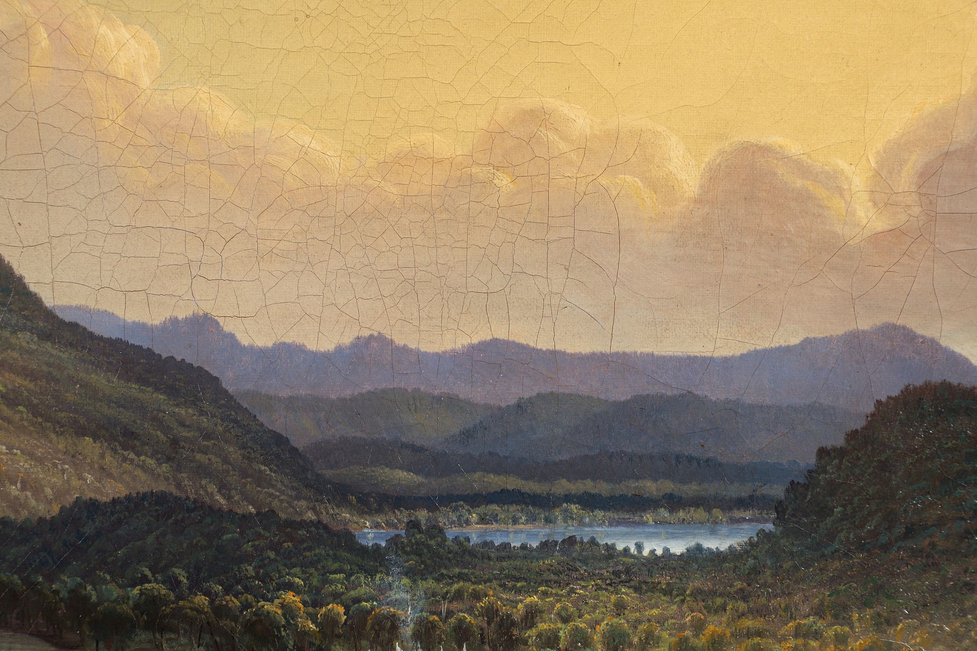 A romanticized landscape painting depicting a river valley with indigenous figures on a rocky cliff.