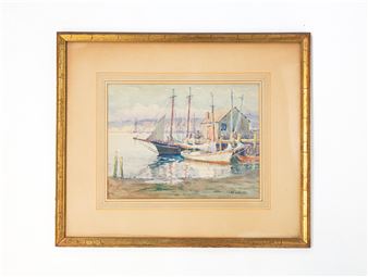 A serene harbor scene featuring fishing boats docked near a small building.