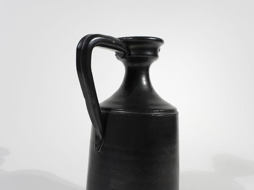 Jean Marais | Shiny black glazed ceramic pitcher | MutualArt