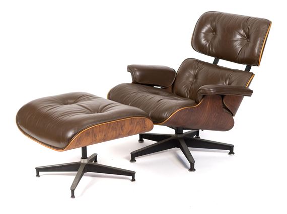 A mid-century modern lounge chair and ottoman set featuring brown leather, wood veneer, and a black metal base.