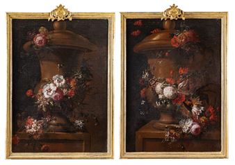 A pair of paintings of flowers in a vase on a table.