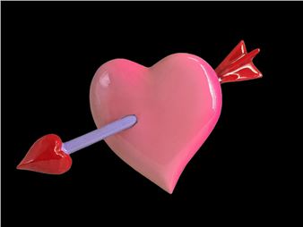 A glossy pink heart pierced by a red and purple arrow against a black background.
