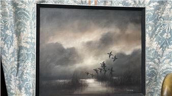 A moody landscape painting of a misty marsh with flying birds.