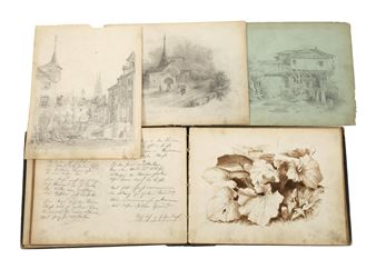 A collection of vintage sketches and handwritten notes arranged in a box.