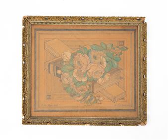 A framed still life featuring a bouquet of flowers resting on stacked books.