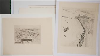 A couple of drawings sitting on top of a table.