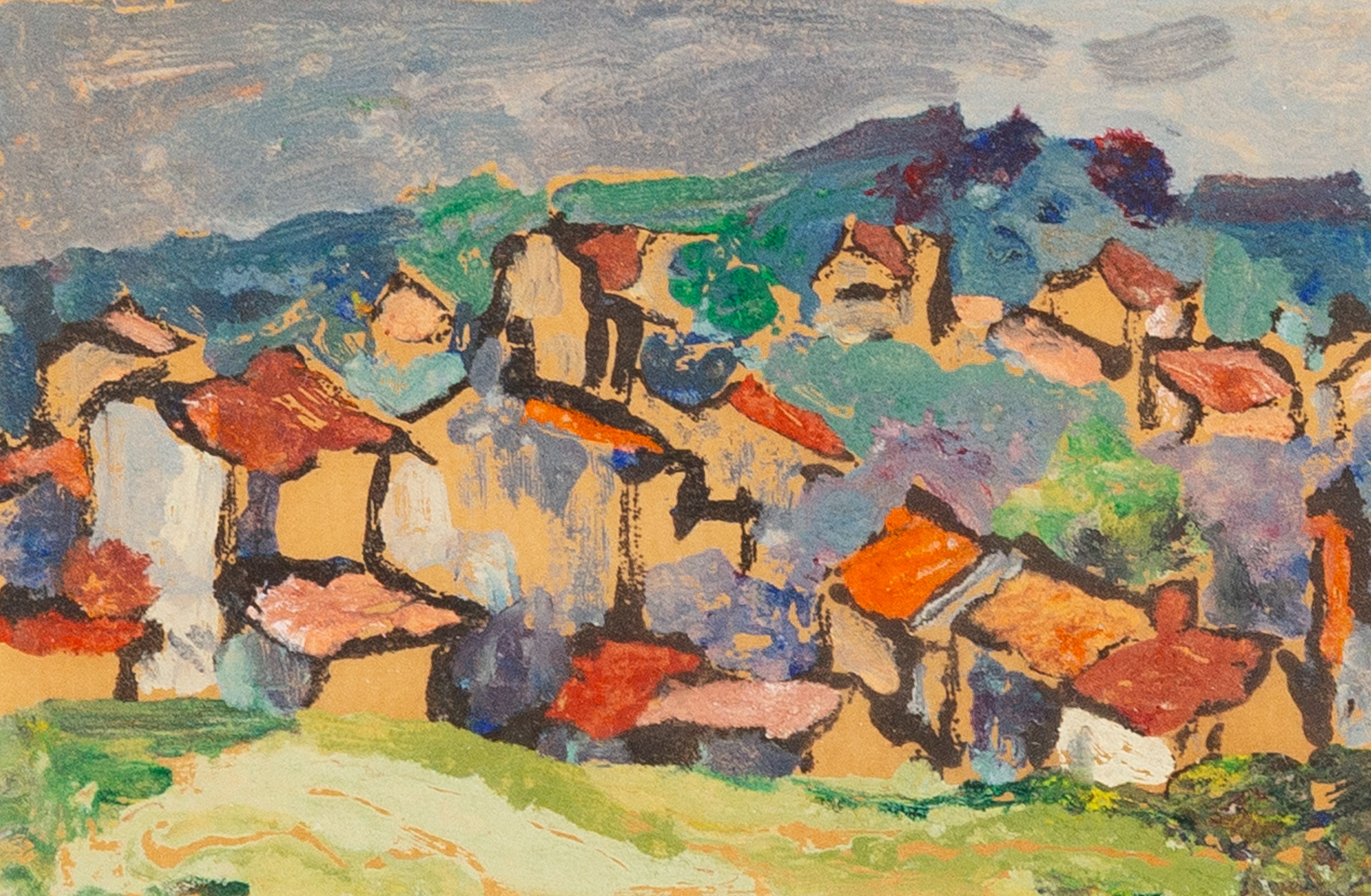 A small framed landscape painting of a village nestled in rolling hills.