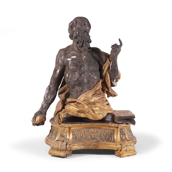 A carved wooden, ebonised and parcel-gilt figure of Saint Jerome - Italian School, 18th Century