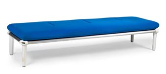 A modern bench with a bright blue cushion and white metal frame.