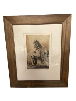 A framed charcoal drawing of a seated figure in profile against a textured background.