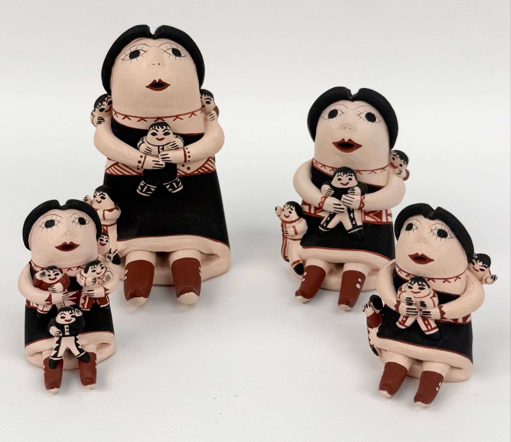 Phyllis Nez | Collection Of Four Storyteller Pottery Figurines | MutualArt