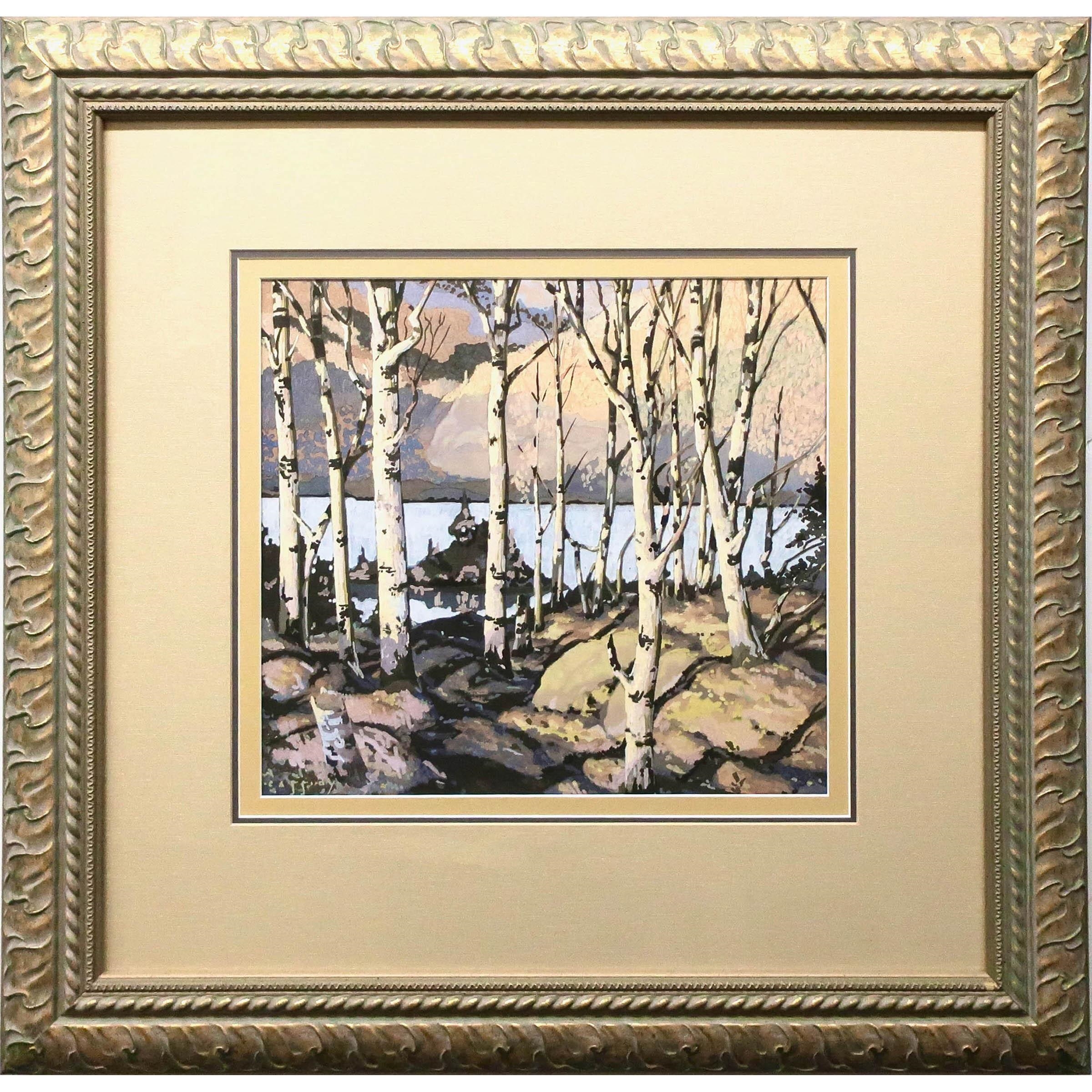 A framed landscape painting of birch trees by a lake with distant mountains.