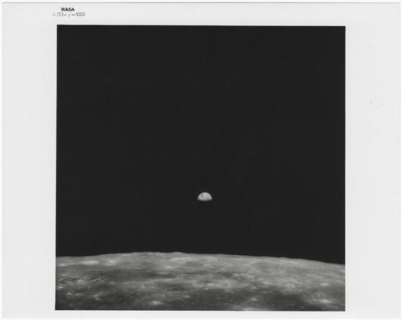 Michael Collins | Earth rising above the lunar horizon with the