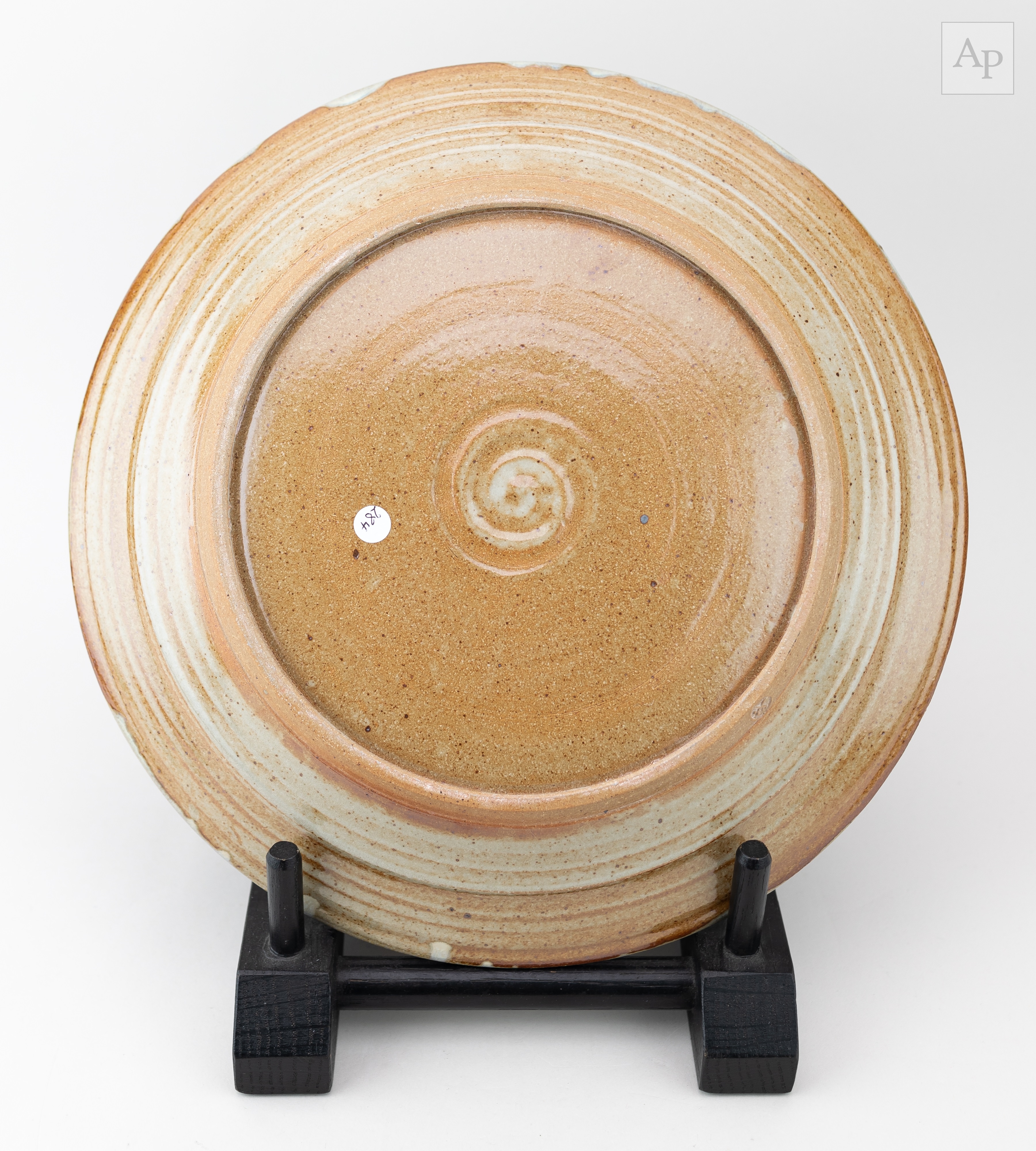 Ray Finch | Winchcombe Pottery; a stoneware charger covered in mottled ...