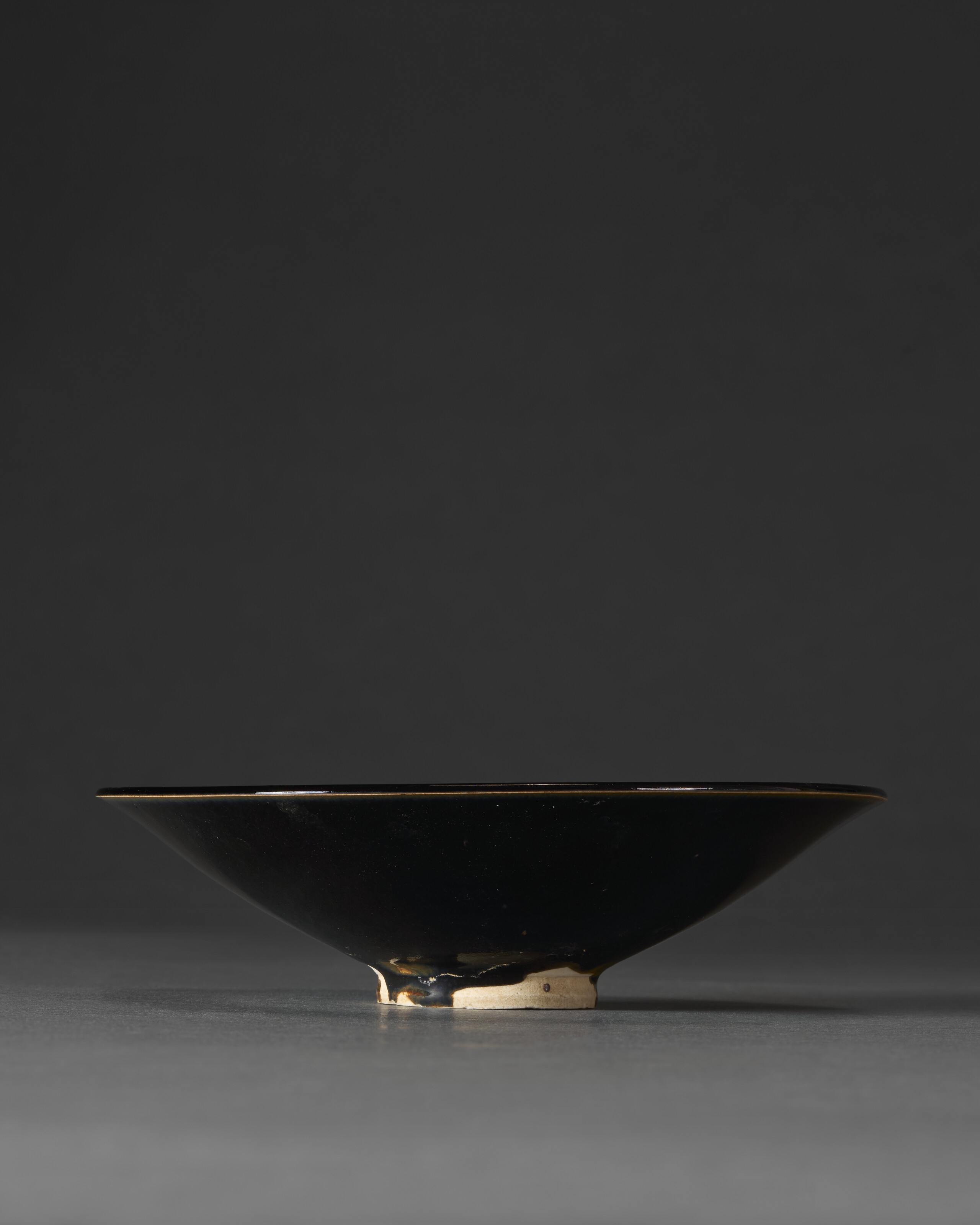 Chinese School, 13th century | A RARE BLACK-GLAZED CONICAL SHALLOW BOWL ...