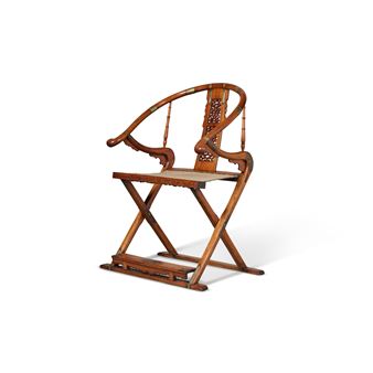 A very rare and important 'huanghuali' folding horseshoe-back armchair (Jiaoyi)