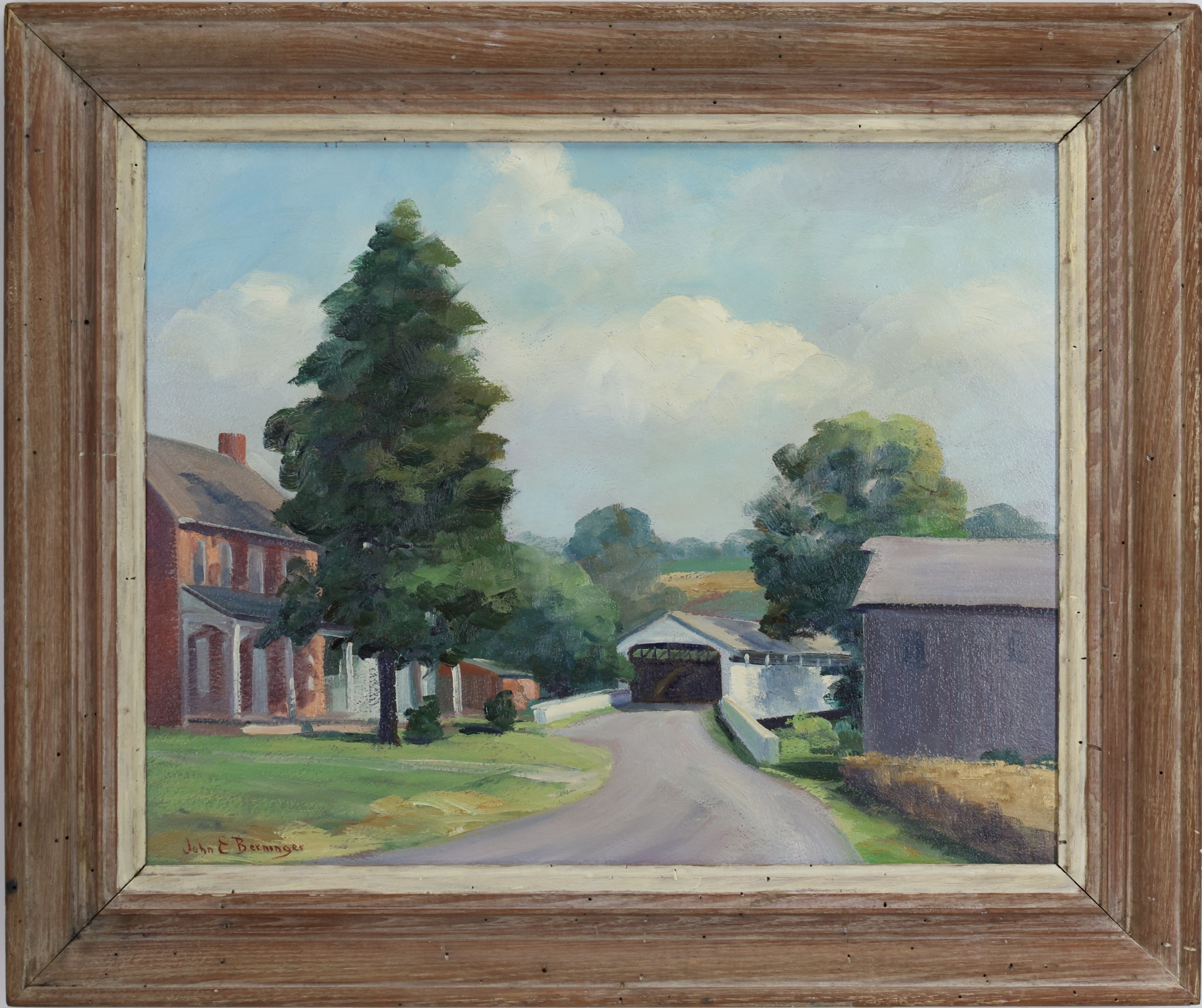 A rural landscape painting featuring a covered bridge, a red brick house, and a large tree under a cloudy sky.