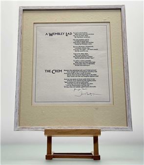 A framed poem on a wooden easel.