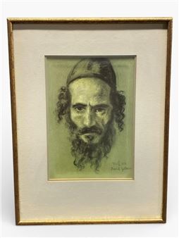 A framed charcoal portrait of a bearded figure with intense eyes against a muted green background.
