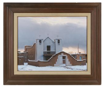 A framed painting of a snow-covered mission-style church under an overcast sky.