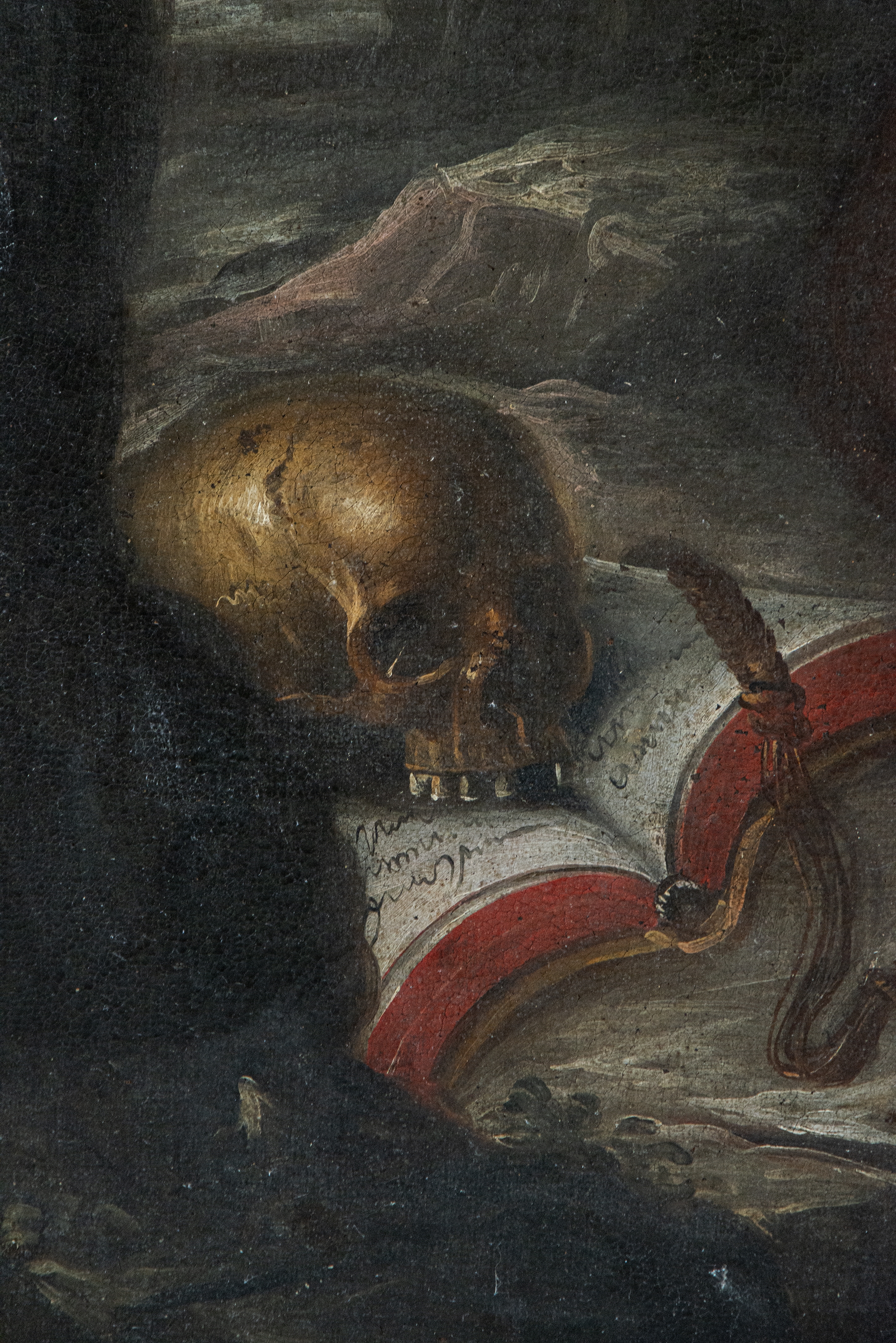 A solemn religious portrait of a bearded figure in dark robes holding a staff, set against a dramatic cloudy sky.
