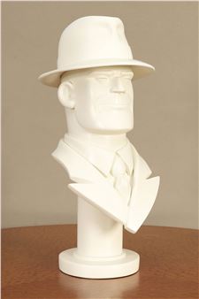 A white sculpted bust of a figure in a fedora and suit, rendered with smooth, matte surfaces.