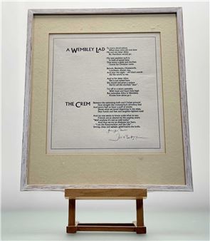 A framed poem displayed on a wooden easel.