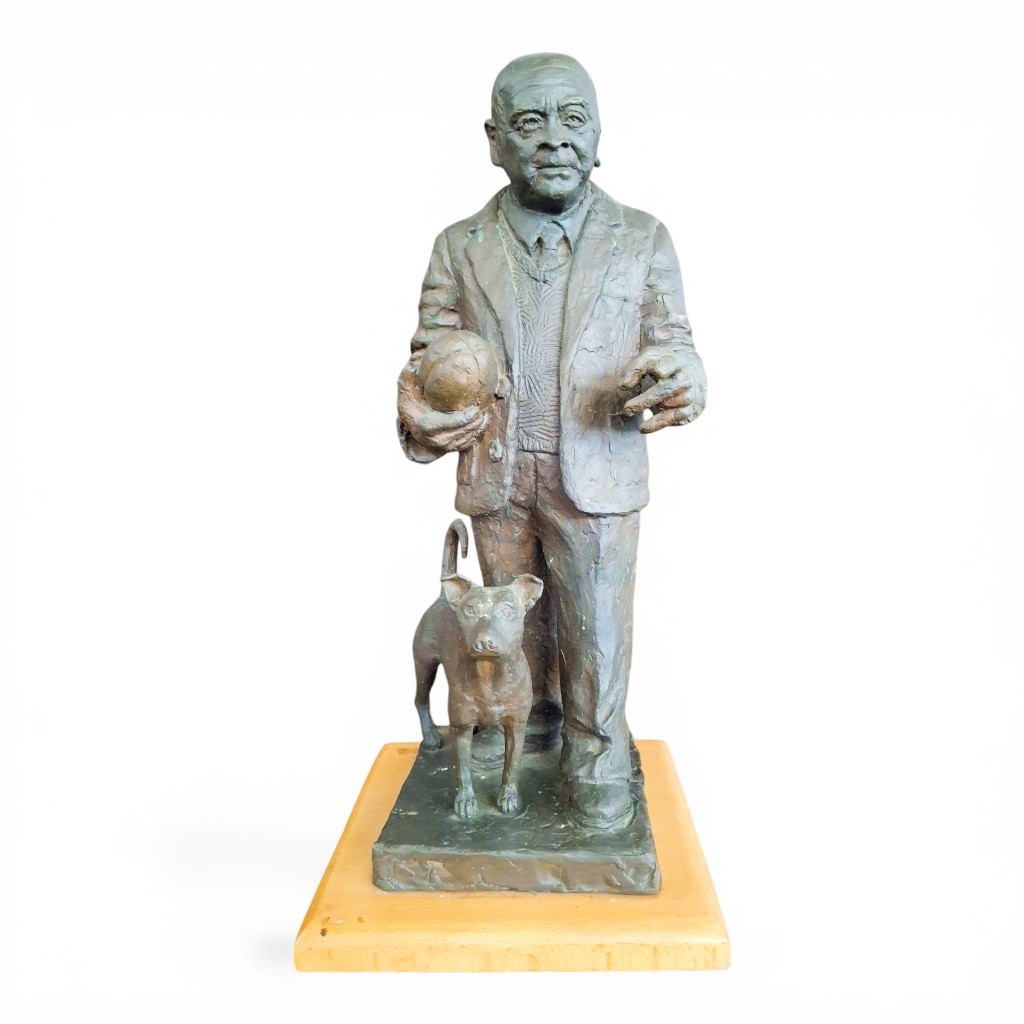 Pierre Volschenk | BRONZE FIGURINE DEPICTING DOC DANIE CRAVEN WITH A ...