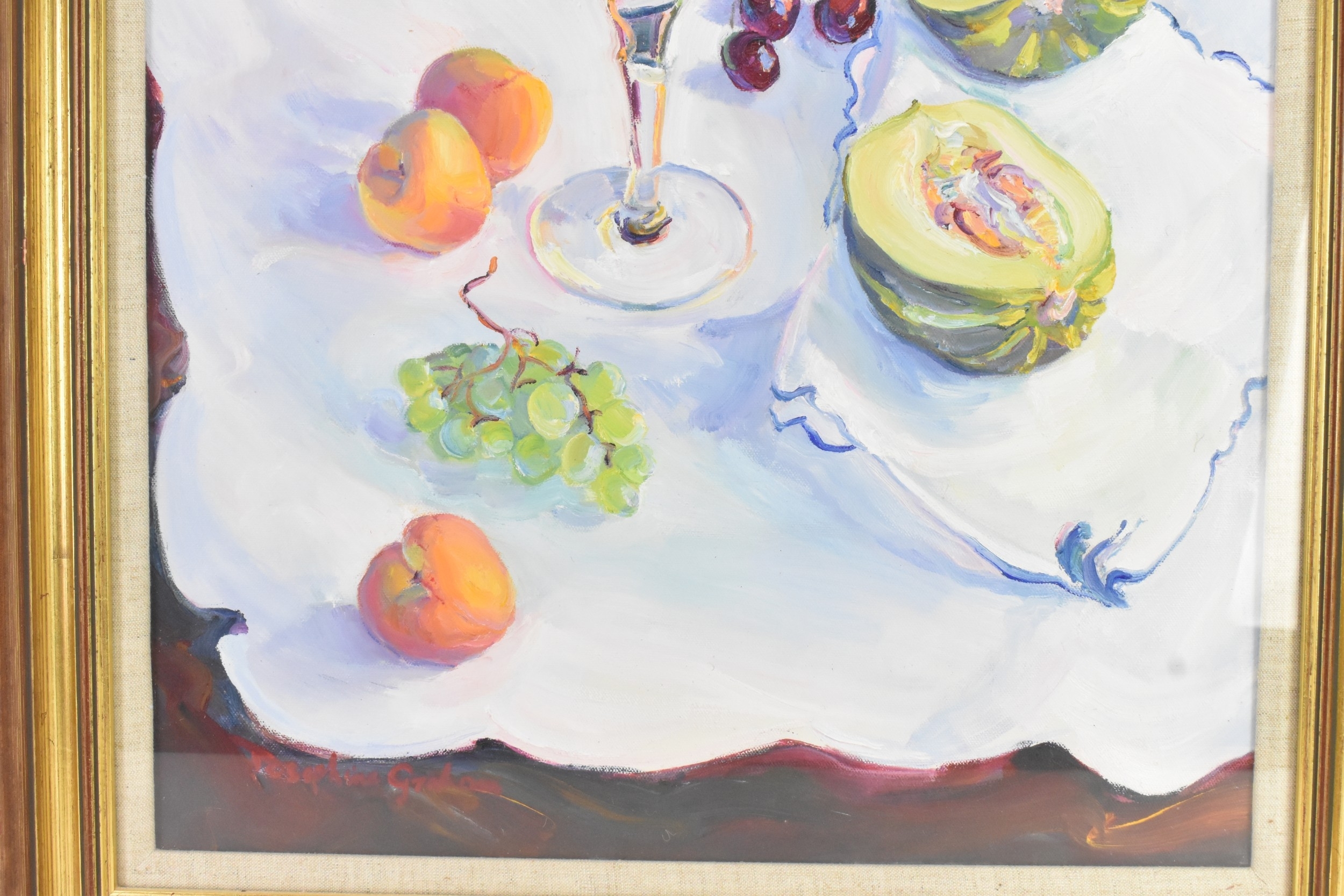 A still life painting featuring a glass bowl of red fruit and halved melons on a white cloth.